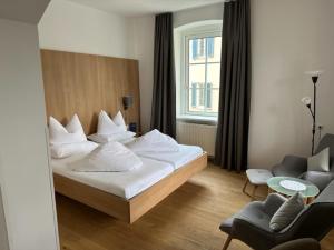Postel nebo postele na pokoji v ubytování Hotel Kendler