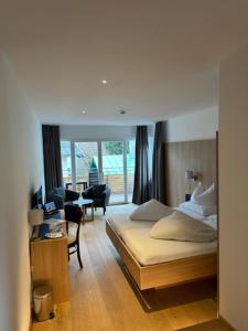 Letto o letti in una camera di Hotel Kendler