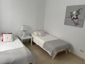Posteľ alebo postele v izbe v ubytovaní Stunning Modern 2 Bedroom Apartment - Alcazaba Lag + 25 fotografií