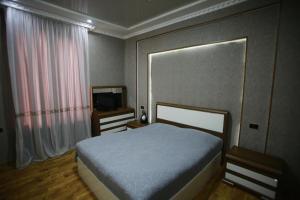 Giường trong phòng chung tại Guest House Nikola