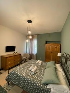 Postel nebo postele na pokoji v ubytování Delle Rose Rooms