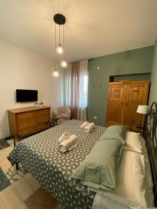 Postel nebo postele na pokoji v ubytování Delle Rose Rooms