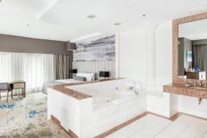 Posezení v ubytování Atheneum Suite Hotel