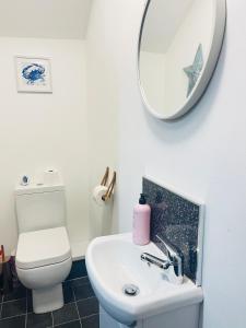 Et badeværelse på Elegant studio1 netflix bathroom close to beach