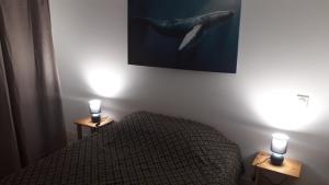 Łóżko lub łóżka w pokoju w obiekcie LOCABEACH