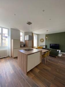 Η κουζίνα ή μικρή κουζίνα στο Le VH - Appartement 3 chambres +6 φωτογραφίες