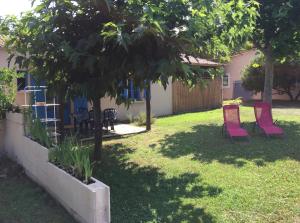 Vonkajšia záhrada v ubytovaní Appartements bord de mer - Accès privé à la plage