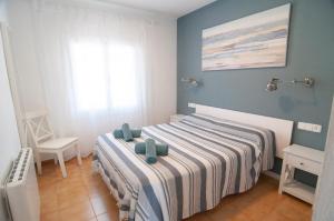 Posteľ alebo postele v izbe v ubytovaní Seafront L'Estartit Roof