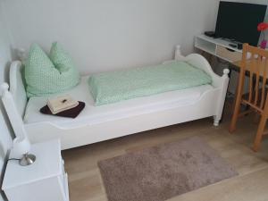 Ліжко або ліжка в номері Edemissener Gästezimmer