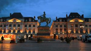 a statue of a man on a horse in front of a building at ibis Orléans Centre Foch in Orléans