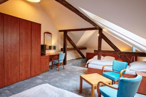 Posteľ alebo postele v izbe v ubytovaní Hotel Terasa
