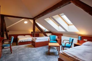 Posteľ alebo postele v izbe v ubytovaní Hotel Terasa