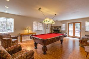 a living room with a pool table in it at Inside Yosemite Winter Wonderland in Yosemite West