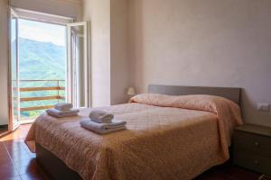 Postel nebo postele na pokoji v ubytování Albergo ristorante Payarin