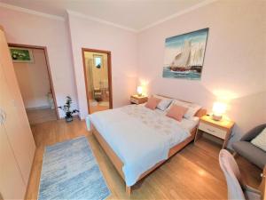 Voodi või voodid majutusasutuse Rooms Irena Gregov toas