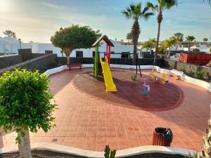 a playground with a slide at Casa Tortuga in Costa Teguise