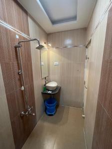 Ванная комната в Hotel Gulmohar