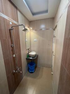 Koupelna v ubytování Hotel Gulmohar