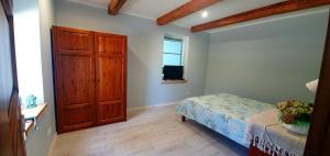 Postel nebo postele na pokoji v ubytování ApartmentApsuciems