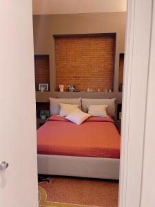 Ένα ή περισσότερα κρεβάτια σε δωμάτιο στο Casa di Olli