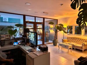 TV a/nebo společenská místnost v ubytování Apart Hotel Castellon 176