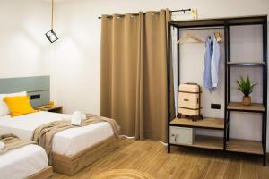 Postel nebo postele na pokoji v ubytování Big Max Guesthouse