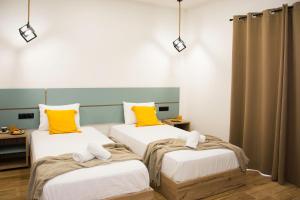 Postel nebo postele na pokoji v ubytování Big Max Guesthouse