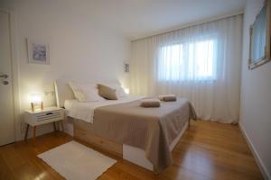 Katil atau katil-katil dalam bilik di Apartman La mama +88 gambar