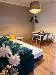 Postel nebo postele na pokoji v ubytování Apartmány Koněvova