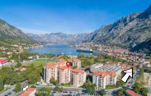 an aerial view of a city and a body of water at The view of Kotor - Sea & Old town view in Kotor