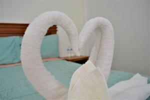 Postel nebo postele na pokoji v ubytování Orquídeas Hotel