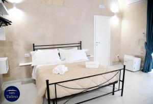Postel nebo postele na pokoji v ubytování B&B Talino + 30 fotografií