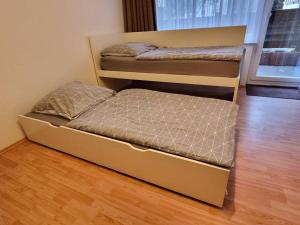 Krevet ili kreveti na sprat u jedinici u okviru objekta Viktoria's Wohnung in Kaarst