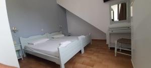 Postel nebo postele na pokoji v ubytování Elia