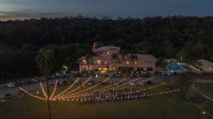 an aerial view of a yard with christmas lights at Hotel Fazenda Brisa Itu in Itu