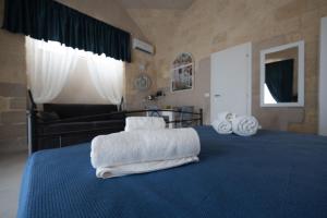 Postel nebo postele na pokoji v ubytování B&B Talino