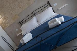 Postel nebo postele na pokoji v ubytování B&B Talino
