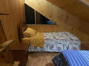 Postel nebo postele na pokoji v ubytování Valle el Abra Ralún Lodge
