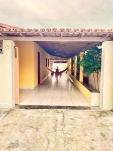 an empty hallway of a building with at Casa de temporada en prado in Prado