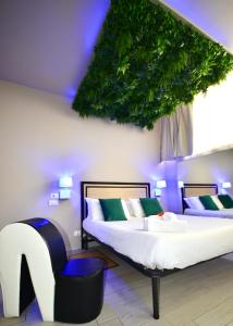 Ένα ή περισσότερα κρεβάτια σε δωμάτιο στο Torino Loft