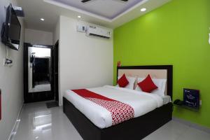 Katil atau katil-katil dalam bilik di Hotel O Raj Palace