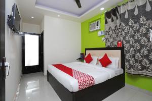 Katil atau katil-katil dalam bilik di Hotel O Raj Palace
