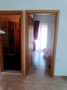 Posteľ alebo postele v izbe v ubytovaní Το σπιτάκι Η Ελιά