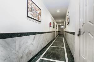 Fotografie z fotogalerie ubytování Collection O Ramji Grand Near Tdi Mall v Novém Dillí