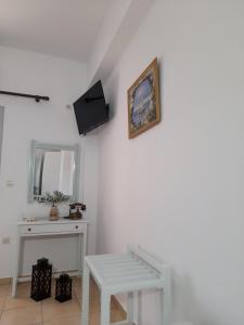 TV a/nebo společenská místnost v ubytování Elia