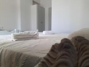 Postel nebo postele na pokoji v ubytování Elia