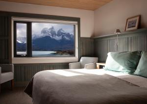 Postel nebo postele na pokoji v ubytování Explora en Torres del Paine - All Inclusive