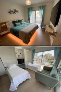 a hotel room with two beds and a tv at GM Premium Portimão in Portimão