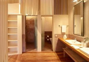 a bathroom with a sink and a mirror at Explora Valle Sagrado in Urubamba