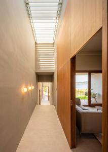 a hallway of a house with a ceiling at INSUA BEACH HOUSE in Pontevedra